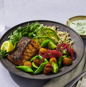 Blackened Salmon Served with Caesar Salad image